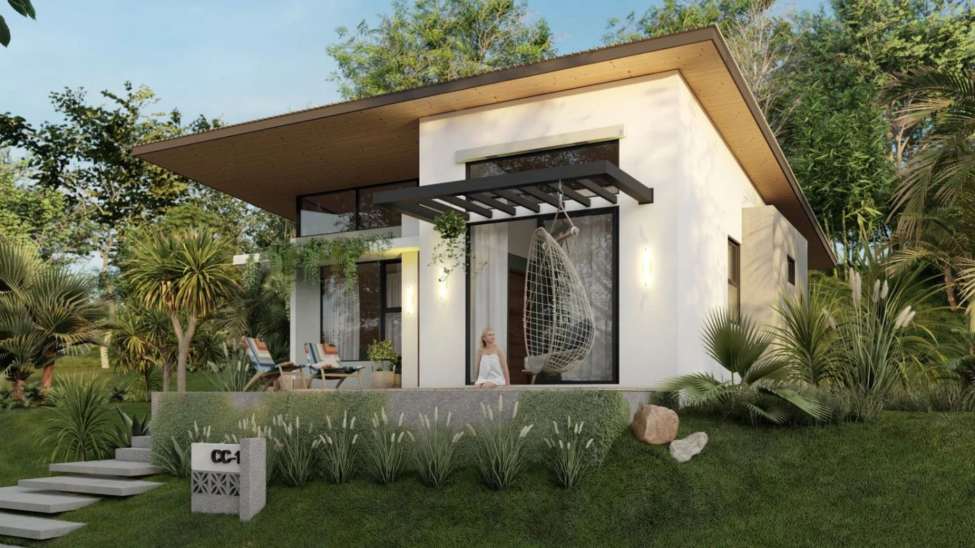 Cotinga home with sliding glass doors and a hanging swing chair