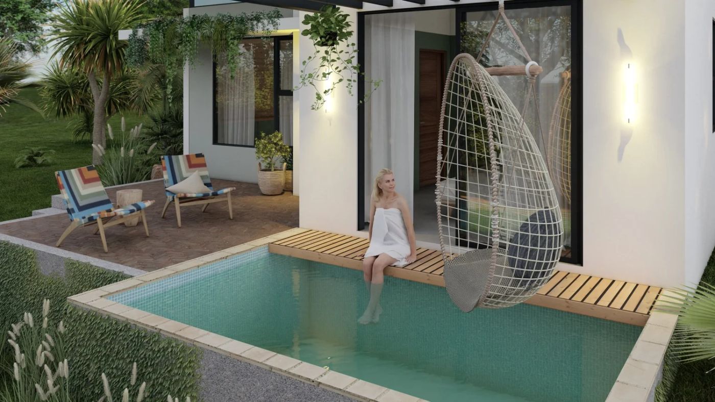 Cotinga patio with lounge chairs and a hanging egg chair