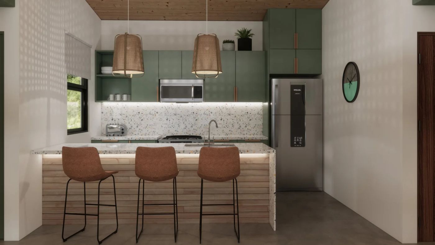 Cotinga kitchen with green cabinets and island